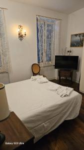 Postel nebo postele na pokoji v ubytování RESIDENZA CarloMaria