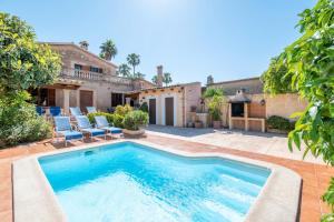 a pool in the backyard of a house at Los Abilios in Palma de Mallorca