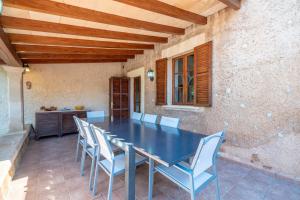 a blue table and chairs on a patio at Los Abilios in Palma de Mallorca