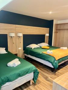 Letto o letti in una camera di Armor Hotel