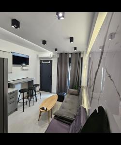 Μια τηλεόραση ή/και κέντρο ψυχαγωγίας στο Ε5CentralApartmentNearTheSea