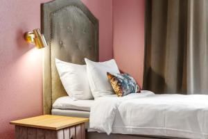 Voodi või voodid majutusasutuse Karlskrona Stadshotell, Best Western Signature Collection toas