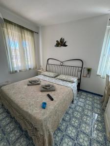 Postel nebo postele na pokoji v ubytování B&B La Marinella
