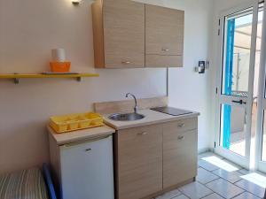 Kuchyň nebo kuchyňský kout v ubytování Guest House Matteo