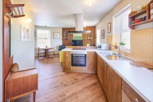 a kitchen with a sink and a counter top at Host & Stay - Lewes Road Apartments in Newhaven