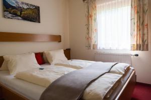 Posteľ alebo postele v izbe v ubytovaní Spreitzhof - Appartements