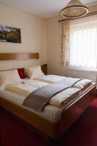 Posteľ alebo postele v izbe v ubytovaní Spreitzhof - Appartements