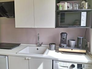 Kuchyň nebo kuchyňský kout v ubytování Nessun dorma b&b Pesaro