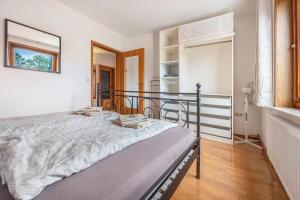 a bedroom with a large bed in a room at Storchenblick in Wunstorf