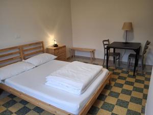 Postel nebo postele na pokoji v ubytování Nessun dorma b&b Pesaro