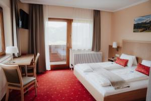 Posteľ alebo postele v izbe v ubytovaní Spreitzhof - Appartements