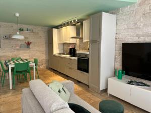 Η κουζίνα ή μικρή κουζίνα στο Green Retreat - Loft sul Mare - Casa Vacanze