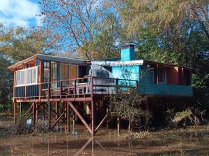 a tree house on a wooden stand in a forest at Samadhi in Tigre