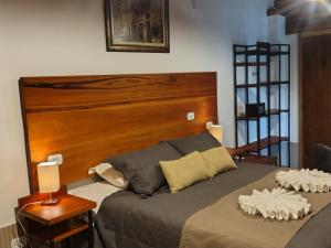 Postel nebo postele na pokoji v ubytování Casarão da Ducha hotel concept