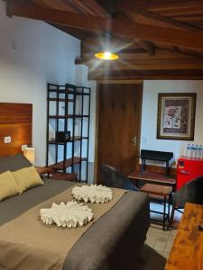 Postel nebo postele na pokoji v ubytování Casarão da Ducha hotel concept