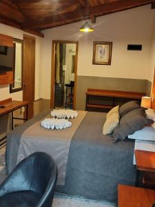 Postel nebo postele na pokoji v ubytování Casarão da Ducha hotel concept