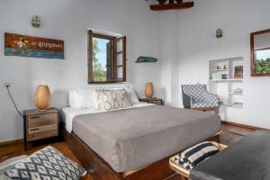 Posteľ alebo postele v izbe v ubytovaní Tresor Boutique Home