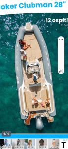 a poster of a boat in the water with people on it at Terrazza Miracapri in Pozzuoli