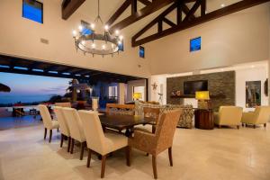 a dining room with a table and chairs at Villa de Suenos by Cabo Villas in San José del Cabo
