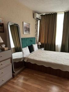 En eller flere senge i et værelse på Hotel Royal + 55 billeder