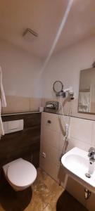 Koupelna v ubytování Hotel Gasthof Jägerhaus