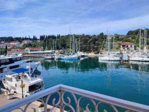 a group of boats docked in a marina at Authentic stone house by the sea in Milna