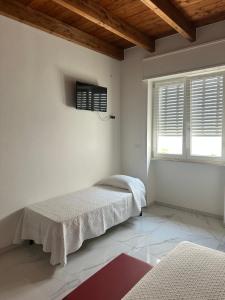Postel nebo postele na pokoji v ubytování Villetta Lucia