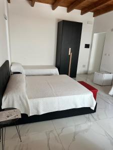 Postel nebo postele na pokoji v ubytování Villetta Lucia