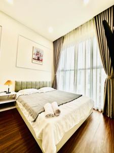 Ένα ή περισσότερα κρεβάτια σε δωμάτιο στο H3 Hawaii Homestay Oceanpark