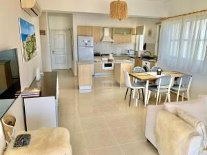 Kuchyň nebo kuchyňský kout v ubytování Boho Bay Apartment
