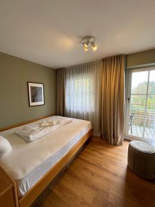 Postel nebo postele na pokoji v ubytování Pilgerhof und Rebmannshof