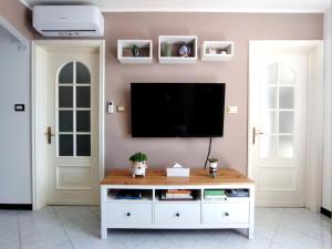 TV a/nebo společenská místnost v ubytování La Casa del Pesto - Guest House