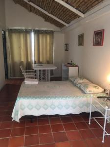 Postel nebo postele na pokoji v ubytování Hotel Aguablanca