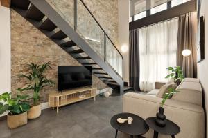 TV a/nebo společenská místnost v ubytování Ola Living MACBA