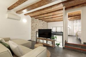 TV a/nebo společenská místnost v ubytování Ola Living MACBA