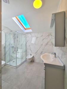 Koupelna v ubytování Opatija Apartments Duema Pobri + 13 fotografií