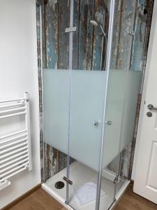 Koupelna v ubytování Hotel meerblau + 37 fotografií