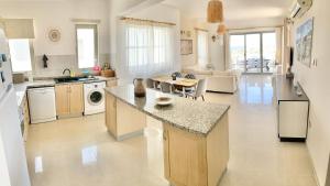 Kuchyň nebo kuchyňský kout v ubytování Boho Bay Apartment