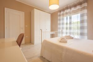 Letto o letti in una camera di Casa vacanze VesuviusView