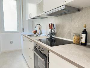 Η κουζίνα ή μικρή κουζίνα στο I-Host Apartment - Lodi 78