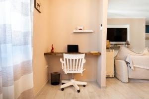 TV o dispositivi per l'intrattenimento presso Casa vacanze VesuviusView