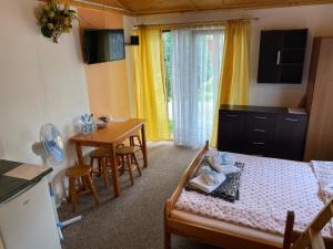 Kuchyň nebo kuchyňský kout v ubytování Domki Letniskowe