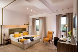 TV a/nebo společenská místnost v ubytování Hotel Domidea