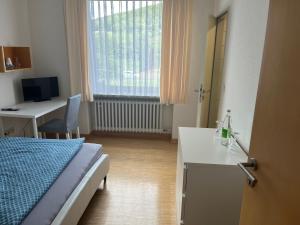 Postel nebo postele na pokoji v ubytování Klosterhof Neustadt am Main