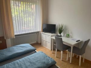 TV a/nebo společenská místnost v ubytování Klosterhof Neustadt am Main