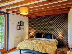 Posteľ alebo postele v izbe v ubytovaní Maison d'hôtes Trip'n Touille