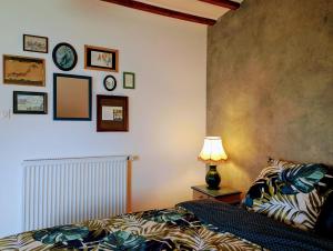 Posteľ alebo postele v izbe v ubytovaní Maison d'hôtes Trip'n Touille