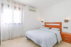 Postel nebo postele na pokoji v ubytování Centro, Atico 2 dormitorios con terraza