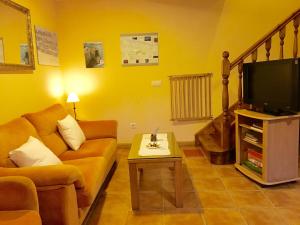 Et tv og/eller underholdning på Apartamentos El Pradón de Santa Marina