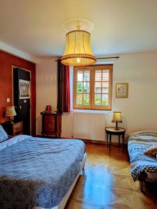 Posteľ alebo postele v izbe v ubytovaní Maison d'hôtes Trip'n Touille